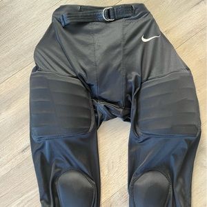 Nike Youth XL padded Football pants, very good condition, black